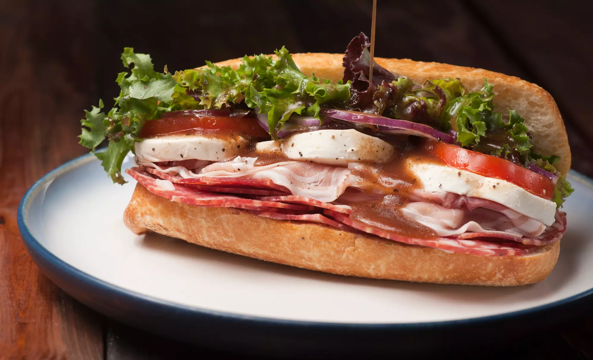 $16.50 for Three vouchers, Each Good for $10 Worth of Sandwiches and Drinks at Sam's To Go ($30 Total Value) - Primary Image