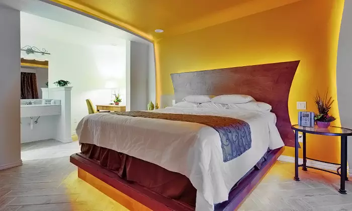 $99 for a 1-Night Stay for Two Adults at Romantic Inn and Suites (Up to $199 Value) - Primary Image