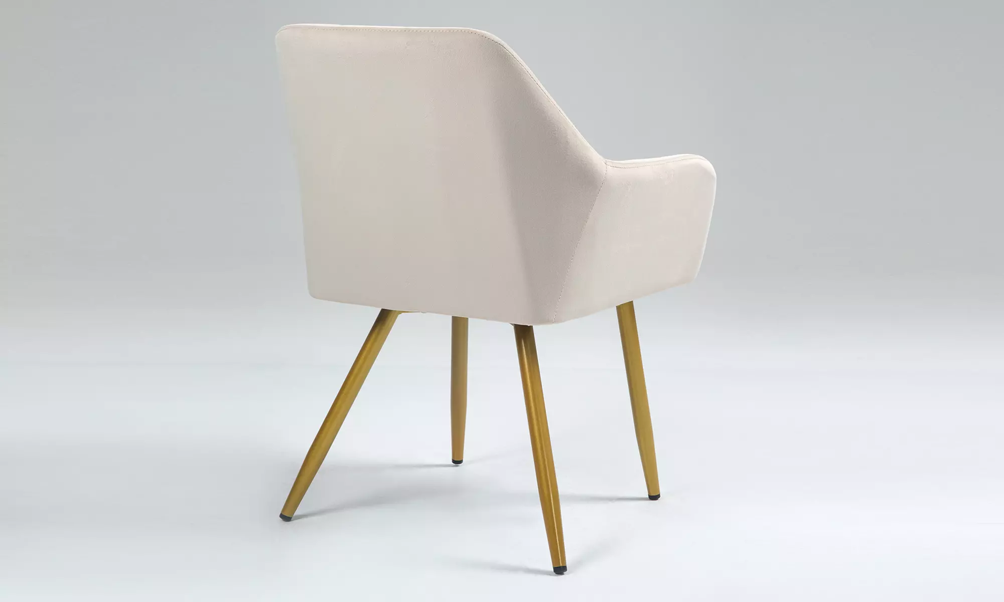 Poltroncina Odette in velluto con braccioli