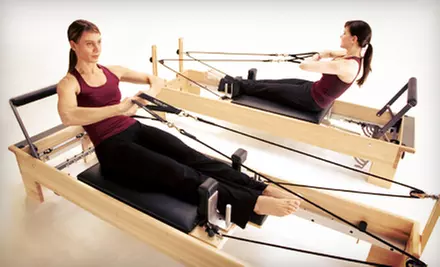 Eight Reformer Pilates Classes or One Month of Unlimited Reformer Classes at Pilates V Studio (Up to 54% Off) - Primary Image