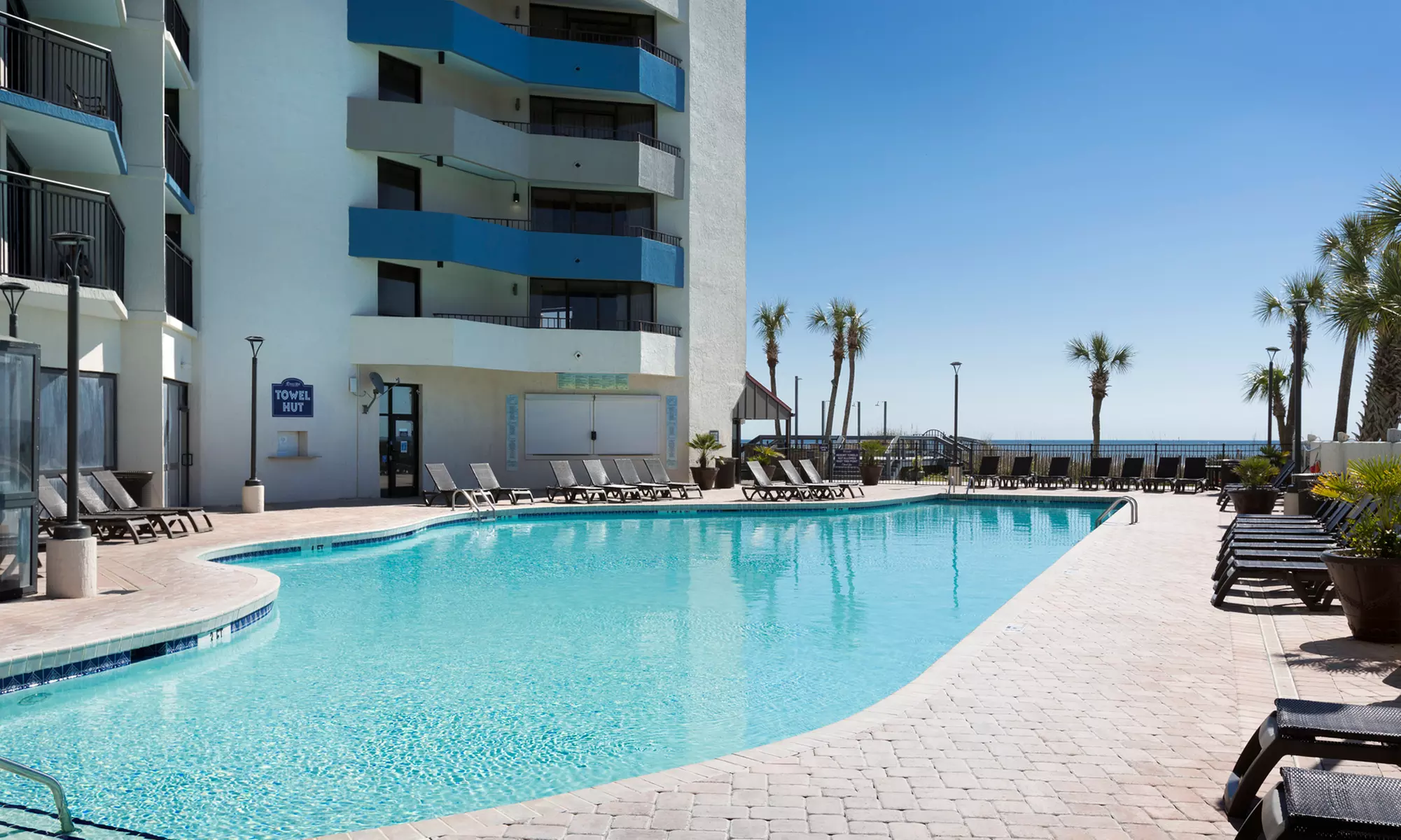Family fun awaits at Ocean Reef Resort—pools, slides & ocean views!