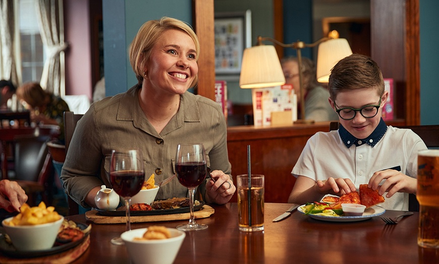 Image 11: Two Starters and Two Skillets at ⭑★ Sizzling Pub & Grill ★⭑