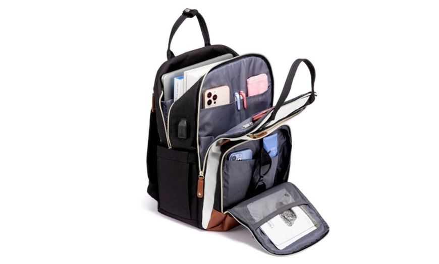 Image 4: Versatile Waterproof Travel Backpack with USB Charging Port