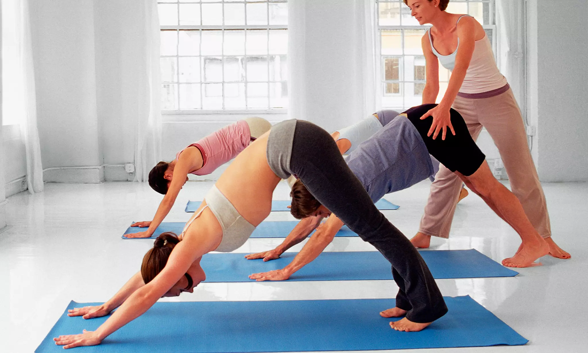 One Month of Hot-Yoga Classes and TRX, or 12 Kids' Mixed Martial Arts Classes at Real Fitness For Women (Up to 90% Off) - Primary Image