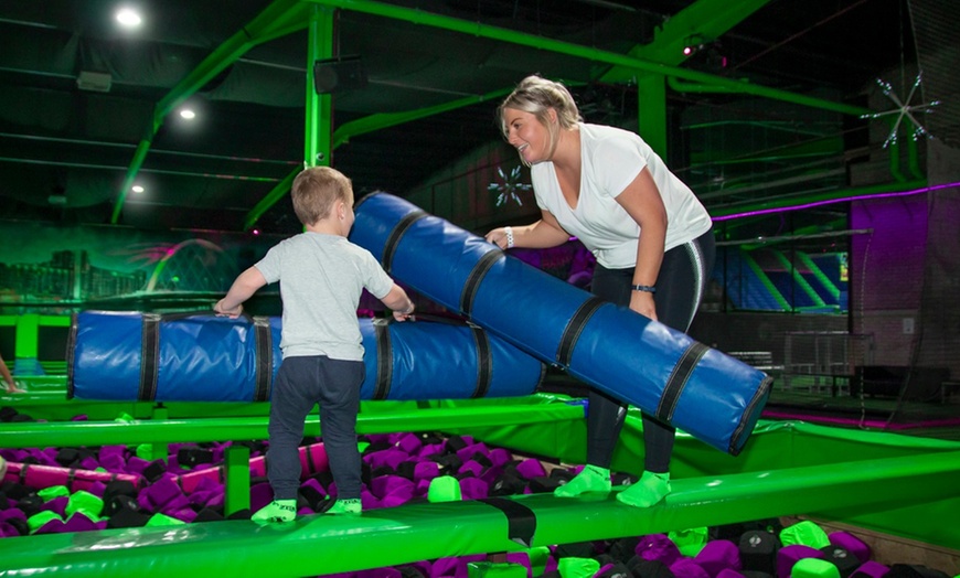 Image 1: Adult and Toddler Trampolining