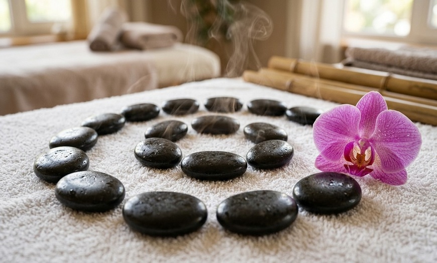 Image 7: 60-Minute Couples Massage with Hot Stones & Towels, Foot Scrub & Mask