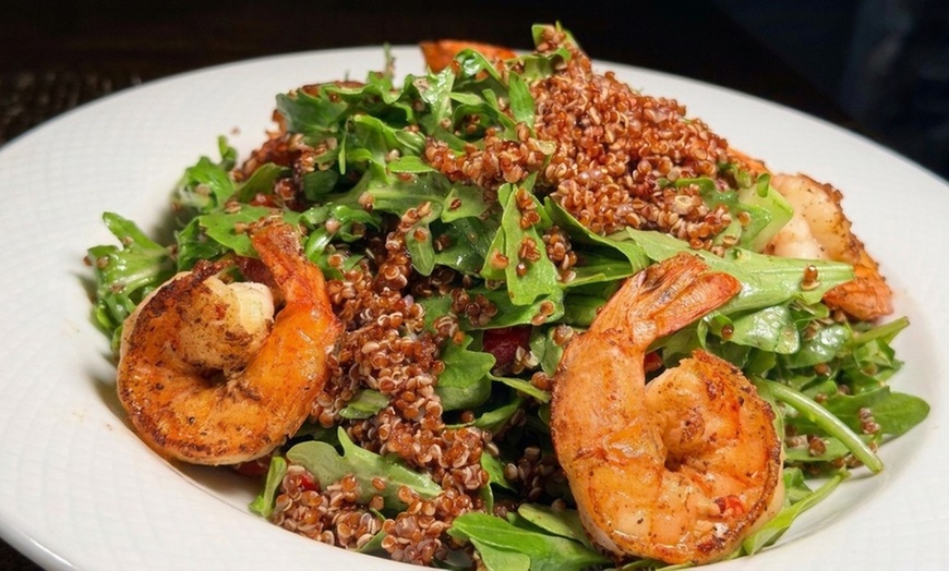Image 10: Enjoy Dining Credit with Warm Ambiance at Lady Wilde's NYC