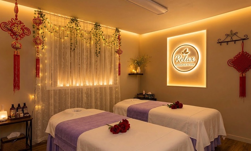 Image 4: Melt Away Tension with Hot Stone & Essential Oil Massage