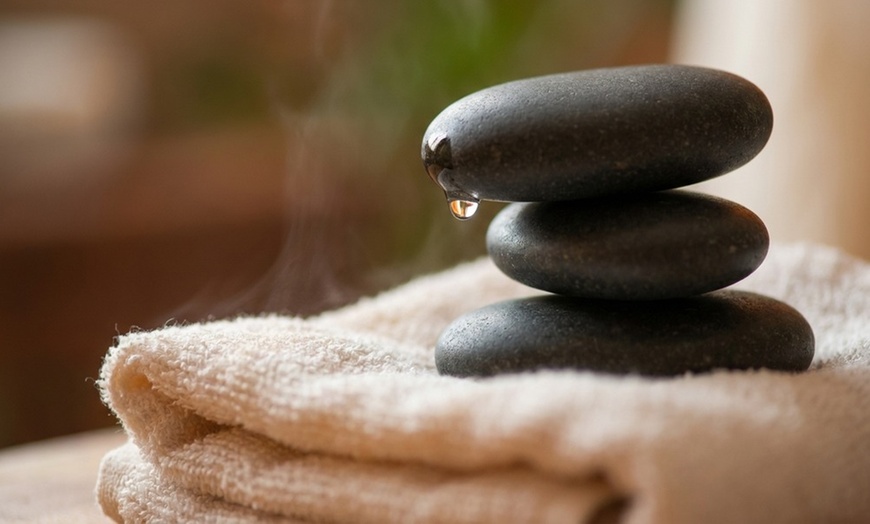 Image 4: One 60 Minute Swedish Massage at Hand & Stone Massage And Facial Spa