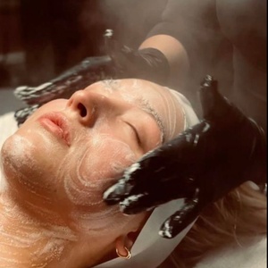 One 60-Minute Hydrodermabrasion Facial with Dermaplaning - Sensational Glow