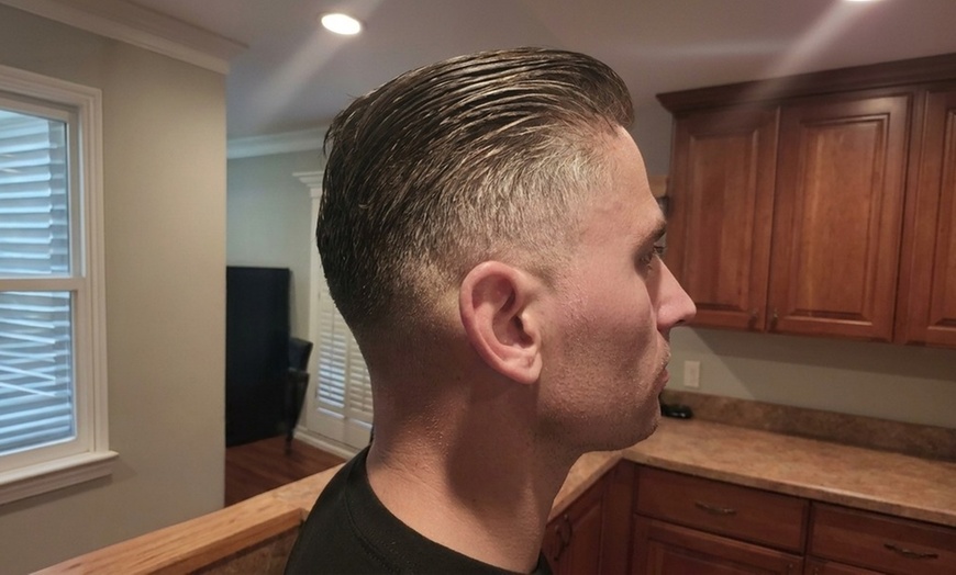 Image 4: Men's Haircut & Style or Color with Hot Towel, Face Mask & Massage