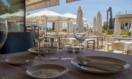 Para 2 personas: cata frente al mar de 4 vinos maridados con crujiente de queso - Restaurante Aral