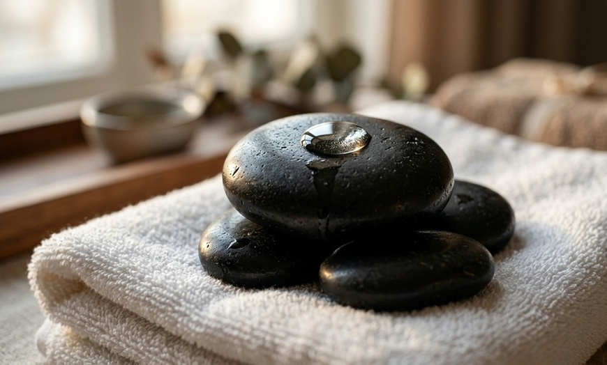 Image 4: 50-Min Foot Reflexology with Sea Salt Soak or 60-Min Therapeutic Body Massage with Hot Stone (Up to 43% Off)
