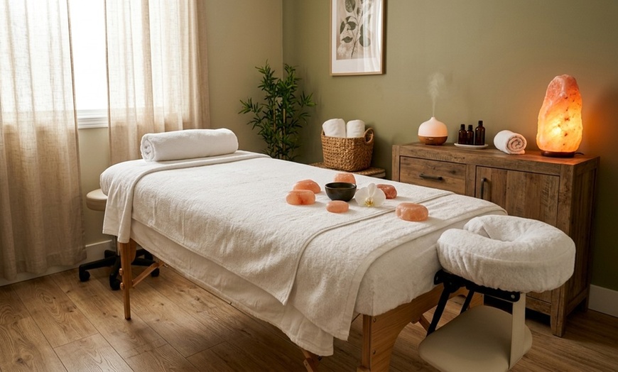 Image 4: Rejuvenate with One Tailored 60-Minute Full Body Massage with Himalayan Stones at Happy Feet Spa - Up to 26% Off