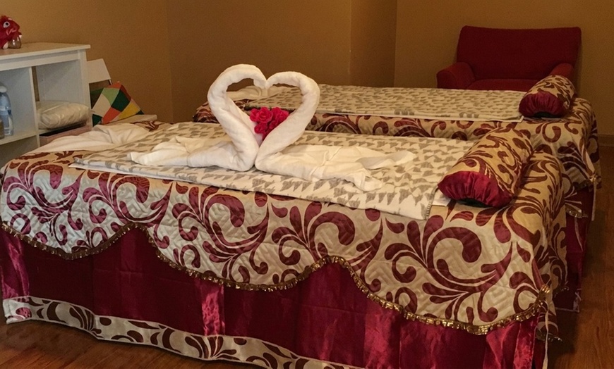 Image 7: Couples Massage with Hot Stone Treatment & Light Therapy Sauna