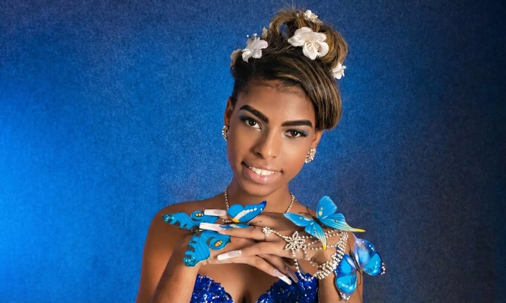 Sesión de fotos de quinceañera con 20 fotos editadas y una ampliación