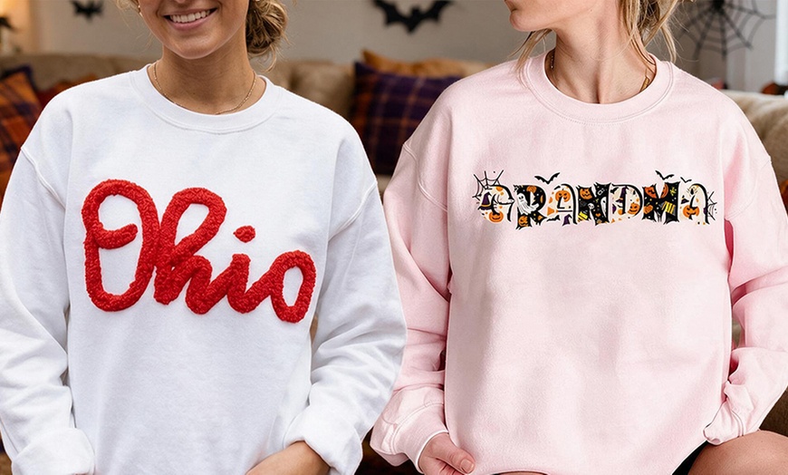Image 16: Personalize a unisex hoodie for the perfect gift or stylish comfort!