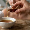 Image 3: 90-Min Hot Stone Body Massage with Scalp Therapy or Lymphatic Drainage
