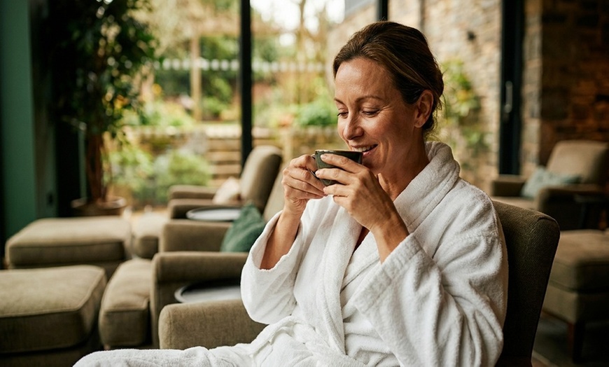 Image 7: 60-Minute Swedish Massage with Hot Towels and Mini or Full Facial