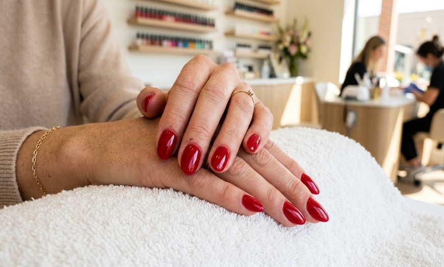 Image 6: Get your nails done with a no-chip or regular mani-pedi