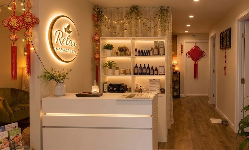 Image 2: Melt Away Tension with Hot Stone & Essential Oil Massage