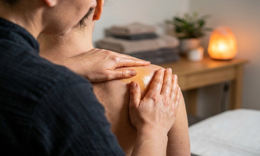 Image 8: 50-Min Deep Tissue/Swedish Massage w/ Warm Stone, Aromatherapy or More