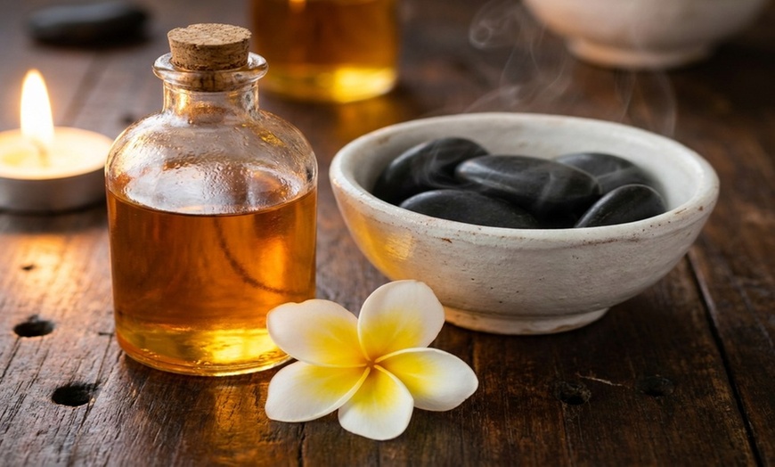 Image 3: Solo or Couples Massage w/ Hot Stones at Four Seasons Spa - Boston, MA