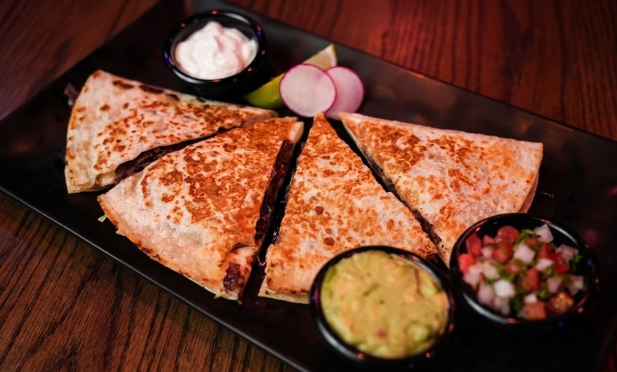 Image 5: Authentic Mexican Dining: Char-Grilled Flavors & Lively Atmosphere