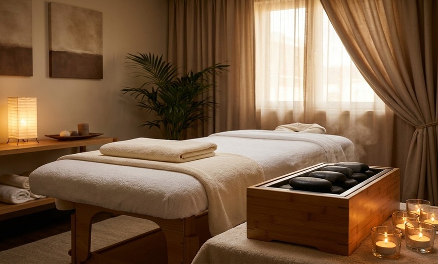 Image 4: 30 or 60 Min Foot Reflexology or Full‑Body Massage with Hot Stones