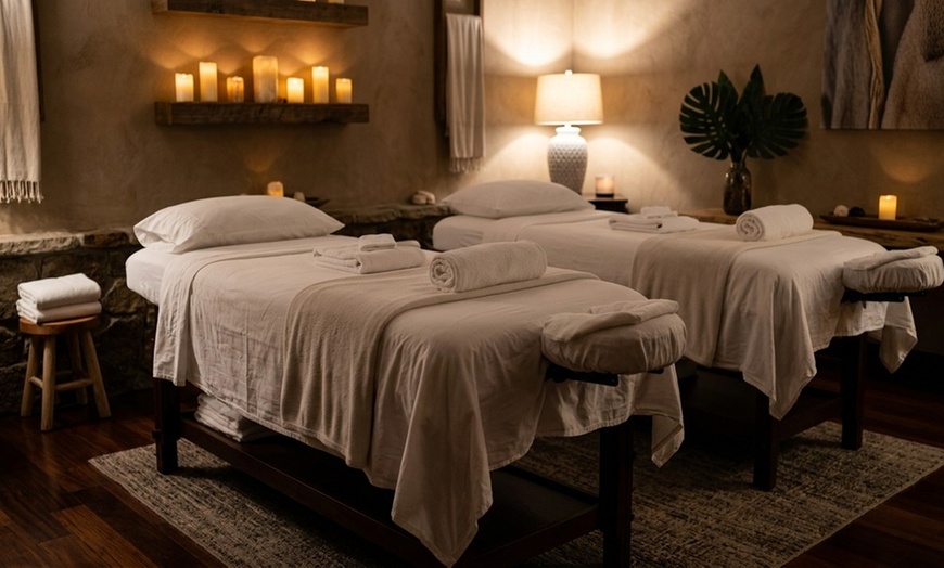 Image 2: Relaxing Couples Massage with Essential Oils and Hot Pack