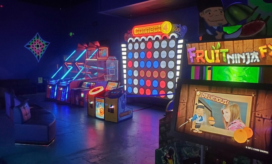 Image 2: One Round of Blacklight Mini Golf with an Arcade Game Card