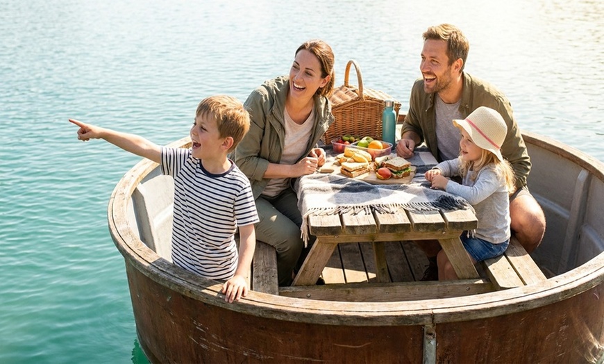 Image 8: Sail into Adventure: Cruise the Waves with Donut Boat Rentals!