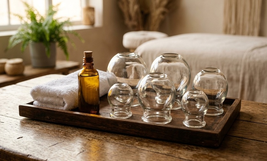 Image 2: Blissful Escape Awaits: 60 or 90-Minute Massage with Hot Stones, Cupping Therapy, and Back Scrub. Save Up to 45%