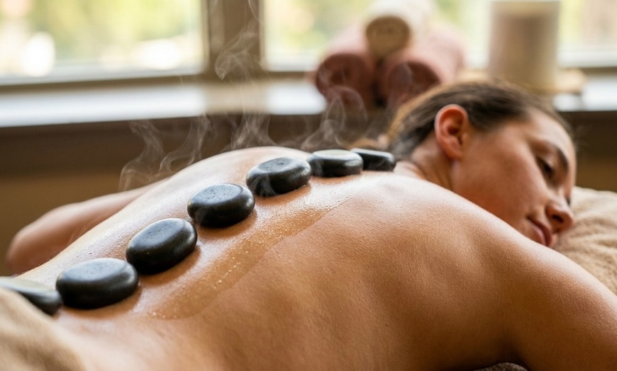 Image 6: Solo or Couples Massage w/ Hot Stones at Four Seasons Spa - Boston, MA
