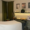 Image 1: Couples Swedish Massage with Hot Stone Relaxation