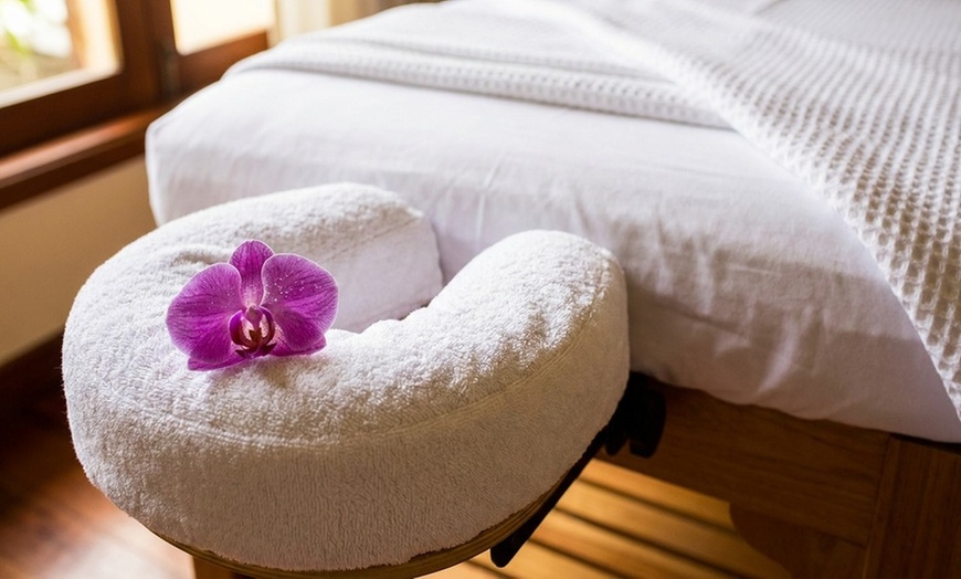 Image 8: 65-Minute Deep Tissue Massage w/ Hot Stones & Oils for One or Couple!