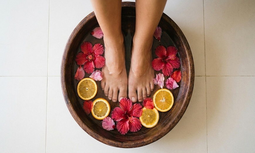 Image 6: 60-Min Foot Reflexology with Hot Stones, Essential Oil, & Foot Soak for 1 or 2 by Experts (Up To 11% Off)