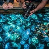 Image 1: Private Bioluminescent Boat Tour for up to 6