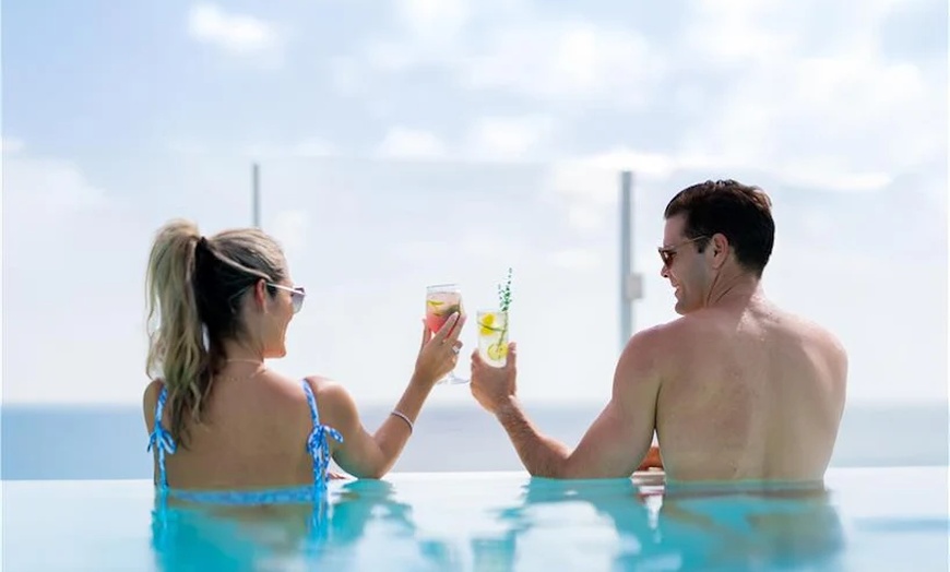 Image 8: Lorelei Signature/ Couple's Massage w/ Champagne, Pool, Gym, & More 