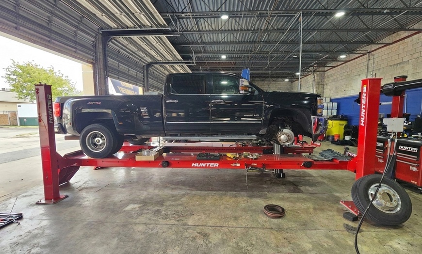 Image 2: Mobil 1 Full Synthetic Oil Change with Tire Rotation & Inspection 
