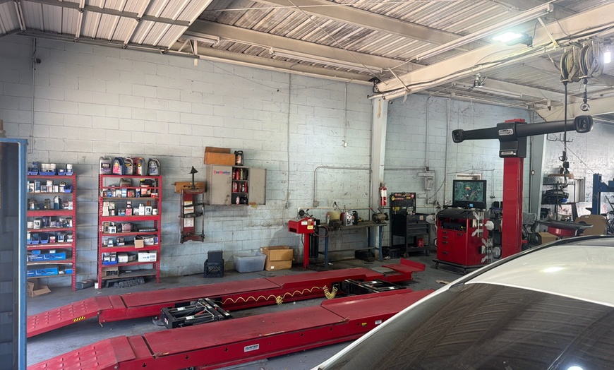 Image 4: Oil Change & A/C Check or Wheel Alignment for Smooth Driving