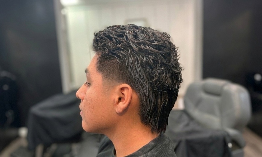 Image 2: Men's Haircut & Style or Color with Hot Towel, Face Mask & Massage