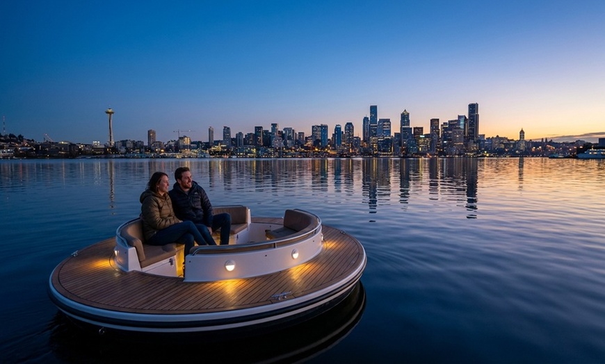 Image 2: Sail into Adventure: Cruise the Waves with Donut Boat Rentals!