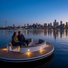 Image 2: Sail into Adventure: Cruise the Waves with Donut Boat Rentals!