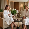 Image 2: 60-Minute Couples Massage with Hot Stones & Towels, Foot Scrub & Mask