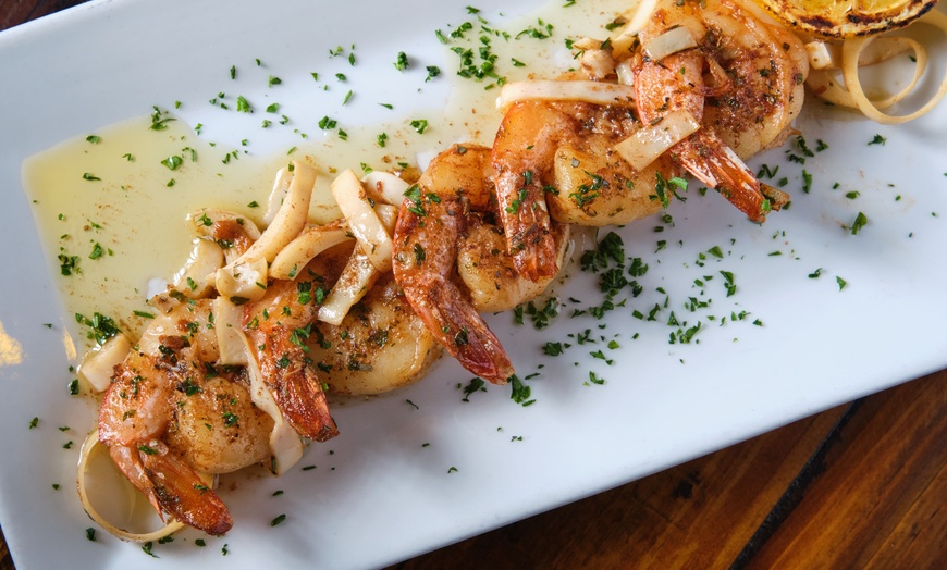 Image 1: Lunch or Dinner Special for 2 or 4 or Loaded Empanada & Sangria Tower