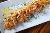 Enjoy a Flavorful Lunch or Dinner Special for 2 or 4 or Loaded Empanada & Sangria Tower ( Up to 21% Off )