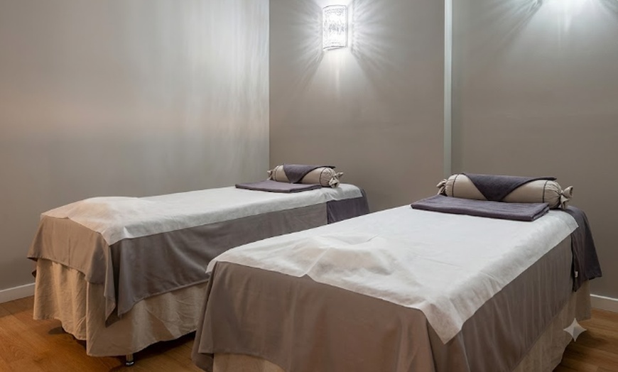 Image 3: Deep-Tissue or Swedish Massage with Hot Stones to Ease Tension