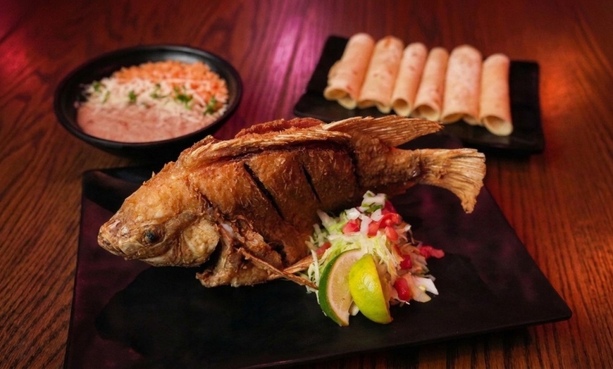 Image 11: Authentic Mexican Dining: Char-Grilled Flavors & Lively Atmosphere