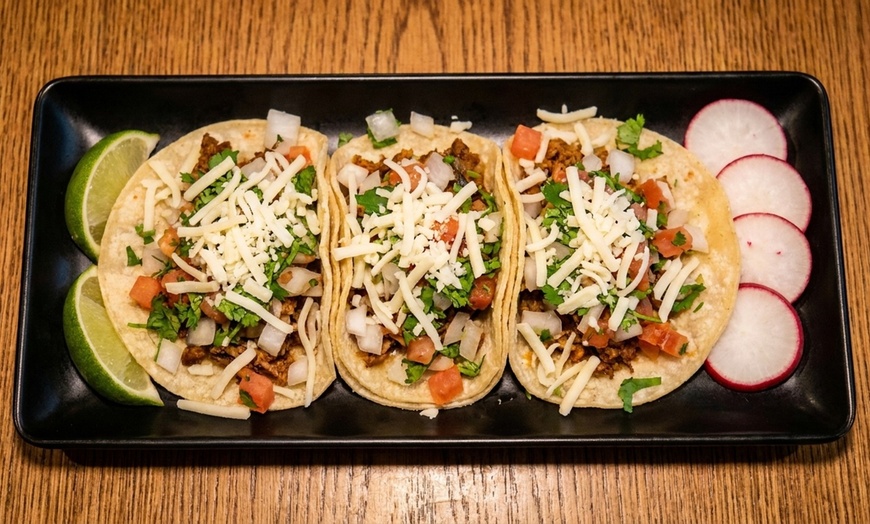 Image 16: Authentic Mexican Dining: Char-Grilled Flavors & Lively Atmosphere